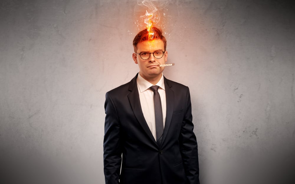 Fever businessman with burning head concept