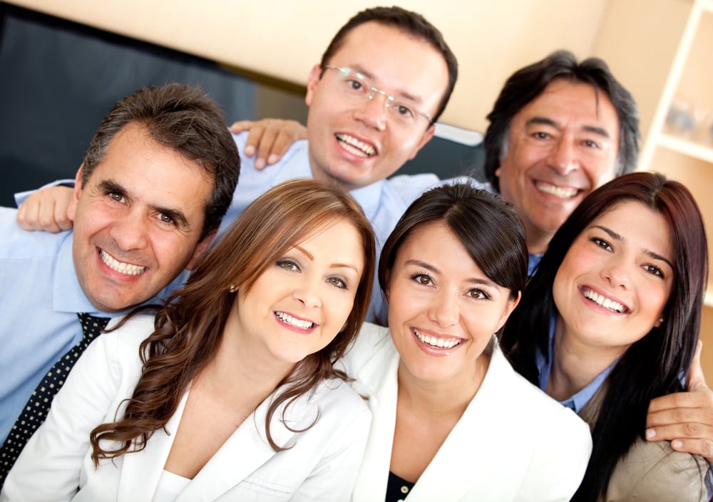 Successful business team looking happy at the office