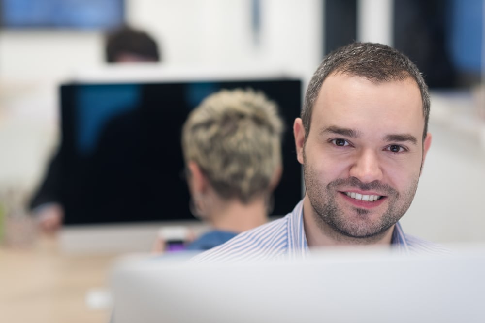 startup business, software developer working on desktop  computer at modern office